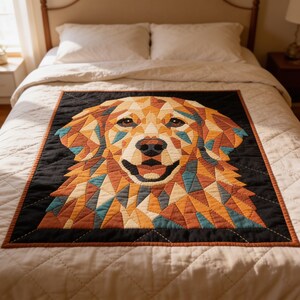 May include: A square quilt featuring a geometric, multi-colored dog portrait centered on a black background. The dog is rendered in shades of gold, tan, brown, and teal, composed of triangular fabric pieces with visible stitching throughout the design.