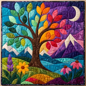 May include: A square fabric wall hanging featuring a central tree with leaves transitioning from green to yellow, orange, and red. The background displays purple mountains, a white crescent moon, and a foreground of green hills with flowers.