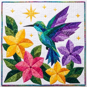 May include: A square fabric wall hanging featuring a pieced quilt design of a hummingbird in flight with purple, blue, and green wings. The bird is surrounded by yellow, pink, and purple flowers, green leaves, and small yellow stars on a white background.