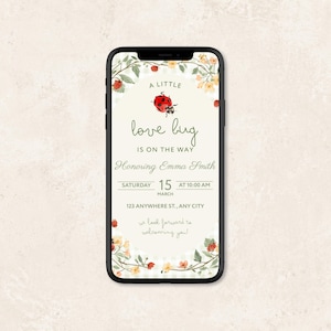 May include: A smartphone displaying a digital baby shower invitation with a ladybug and floral theme. The text reads A LITTLE love bug IS ON THE WAY, Honoring Emma Smith, SATURDAY 15 MARCH AT 10:00 AM, 123 ANYWHERE ST., ANY CITY, we look forward to welcoming you!