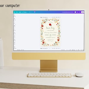 May include: A computer monitor displaying a digital baby shower invitation template with a floral border and ladybug graphics. The text reads A LITTLE love bug IS ON THE WAY, featuring placeholders for names, dates, and times. The screen interface shows editing tools.
