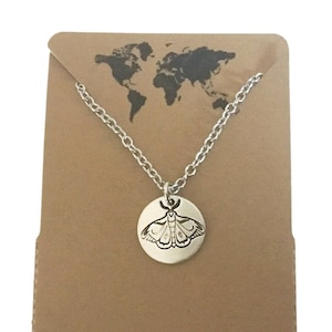 Moth small circular charm necklace in silver color
