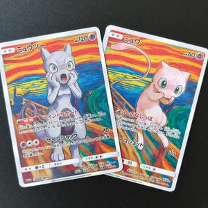 May include: Two rectangular Pokémon trading cards featuring Mewtwo and Mew in a style inspired by The Scream painting. The cards display vibrant orange, yellow, and blue swirling backgrounds with Japanese text, HP values, and attack descriptions.