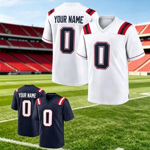 May include: Two white and two navy blue athletic jerseys featuring a V-neck collar, short sleeves, and red and blue shoulder stripes. Each jersey displays the number 0 in a bold font and the placeholder text YOUR NAME on the back.