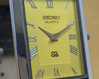 vintage Seiko Slim Tank Quartz Men,s Wrist watch Gold Dial Japan Made Free shipping