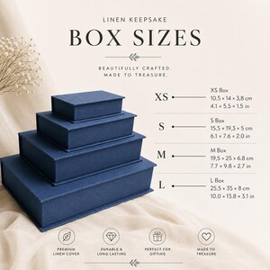 May include: A stack of four rectangular navy blue linen keepsake boxes in sizes XS, S, M, and L. Text includes 'LINEN KEEPSAKE BOX SIZES', 'BEAUTIFULLY CRAFTED. MADE TO TREASURE.', and specific dimensions in inches and centimeters for each box size.