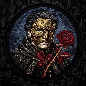 May include: A circular embroidered patch featuring a person wearing an ornate gold mask with intricate mechanical details. The figure is dressed in a dark textured cloak and holds a single vibrant red rose with green leaves against a blue background.