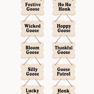 May include: Ten light-colored wooden plaques with scalloped edges, each hanging from a jute twine loop. The plaques feature black text: Festive Goose, Ho Ho Honk, Wicked Goose, Hoppy Goose, Bloom Goose, Thankful Goose, Silly Goose, Goose Patrol, Lucky Goose, and Honk Squad.
