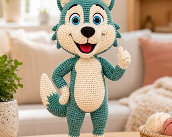 May include: A teal and cream-colored crocheted stuffed animal resembling a wolf or fox character. The figure features large blue eyes, a black nose, an open mouth with a red tongue, and a thumbs-up gesture. It has pointed ears and a bushy tail.