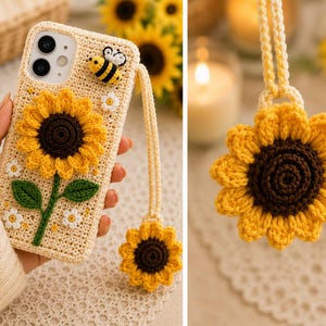 Op de afbeelding: Een beige gehaakt telefoonhoesje met een grote gele zonnebloem met een donkerbruin hart, groene bladeren, kleine witte bloemetjes en een kleine bijenapplicatie. Een bijpassende zonnebloemhanger hangt aan een lang, gevlochten beige polsbandje.