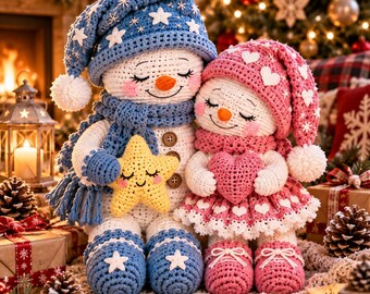 May include: Two crocheted snowman dolls with white bodies and orange noses. The left doll wears a blue hat and scarf with white stars, holding a yellow star. The right doll wears a pink hat and scarf with white hearts, holding a pink heart.