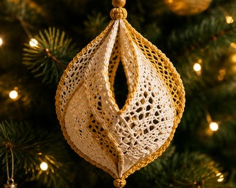 May include: A hanging ornament featuring a teardrop-shaped structure made of cream and mustard yellow crocheted lace. The design includes a central open space, wooden beads at the top and bottom, and a dual-colored tassel hanging from the base.