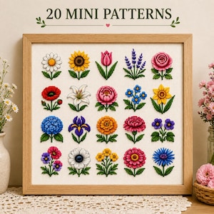 May include: A framed embroidery sampler featuring 20 mini patterns of various colorful flowers arranged in a grid on white fabric. The text 20 MINI PATTERNS is printed at the top. The flowers include daisies, sunflowers, tulips, lavender, and roses.