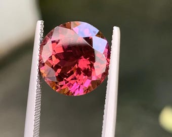 Tormalina rotonda sfaccettata, 7,02 ct, rosa-arancio (Africa)
