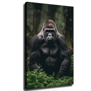 May include: A vertical canvas wall art print featuring a detailed portrait of a silverback gorilla. The gorilla has dark black fur, a prominent silver-grey patch on its head, and a focused expression, set against a dark, blurred forest background.