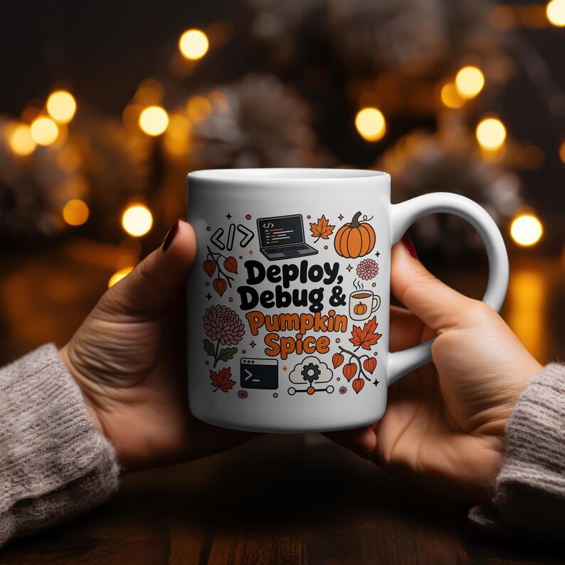 May include: A white ceramic mug featuring a colorful graphic print with the text "Deploy, Debug & Pumpkin Spice." The design includes illustrations of a laptop, a terminal window, a pumpkin, autumn leaves, flowers, and a coffee mug.