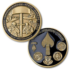 May include: A gold-toned challenge coin featuring military imagery and text including USASOC, NAVSPECWARCOM, AFSOC, MARSOC, JSOC, and the phrase QUIET PROFESSIONALS. The reverse side displays a large spade emblem and U.S. SPECIAL OPERATIONS COMMAND text.