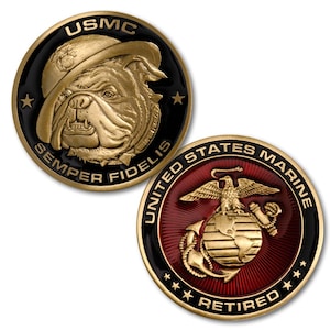 May include: Two circular challenge coins featuring gold-toned metal relief. One coin displays a bulldog wearing a helmet with the text USMC and SEMPER FIDELIS. The other coin shows the United States Marine Corps emblem with the text UNITED STATES MARINE RETIRED.
