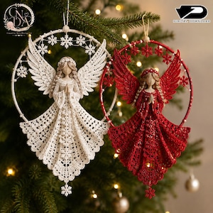 May include: Two crocheted angel ornaments, one white and one red, each centered within a circular hoop frame adorned with small snowflake cutouts. The angels feature braided hair, wings, and hands pressed together in a prayer position.