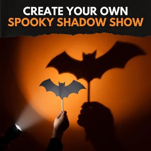 May include: A black paper bat cutout on a stick held in front of a flashlight, casting a large bat shadow on an orange background. The text at the top reads CREATE YOUR OWN SPOOKY SHADOW SHOW in white and orange lettering.