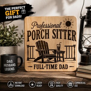 May include: A square wooden sign featuring a laser-engraved illustration of an Adirondack chair on a porch with a drink, a sun icon, and the text: Professional PORCH SITTER FULL-TIME DAD. The sign has rounded corners and a light wood grain finish.