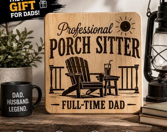 May include: A square wooden sign featuring a laser-engraved illustration of an Adirondack chair on a porch with a drink, a sun icon, and the text: Professional PORCH SITTER FULL-TIME DAD. The sign has rounded corners and a light wood grain finish.