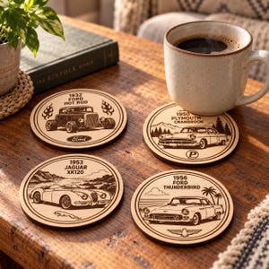 May include: Four circular wooden coasters featuring laser-engraved classic cars. The designs include a 1932 Ford Hot Rod, a 1950 Plymouth Cranbrook, a 1953 Jaguar XK120, and a 1956 Ford Thunderbird, each with specific text and graphic details.
