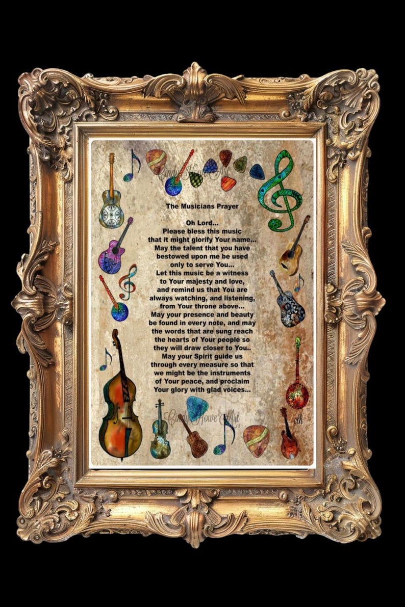 May include: A framed print featuring a musical prayer with various watercolor-style guitars, musical notes, and a treble clef. The ornate gold frame surrounds the text "The Musicians Prayer". The artwork has a vintage aesthetic.