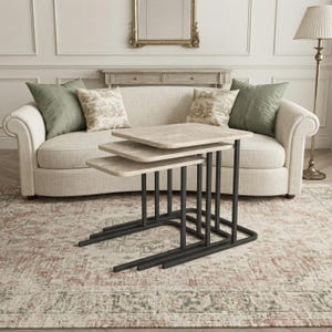 May include: A set of three nesting tables featuring rectangular light wood-toned tops with rounded corners and black metal frames. The tables are arranged in a cascading formation, with each table decreasing in size to fit underneath the next.