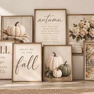 Peut inclure: Une collection de sept cadres muraux sur le thème de l'automne, incluant des citrouilles blanches et vertes, un bouquet de fleurs séchées, un chemin bordé d'arbres et des textes comme autumn, fall, et slower days, happier nights.