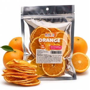 May include: A clear plastic pouch filled with dried orange slices, labeled Crafty Confections Orange Dry Chips, with a net weight of 2.5 oz. The bag is surrounded by fresh whole and halved oranges on a white background, showing nutrition facts.