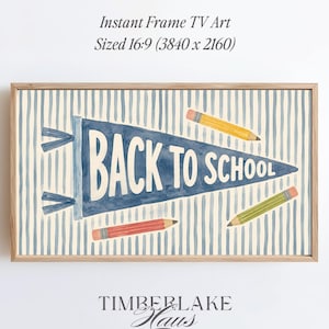 May include: A digital art display for a television featuring a blue pennant with the text BACK TO SCHOOL in white, surrounded by yellow and green pencils against a light blue and white vertical striped background, framed in light wood.