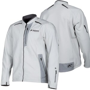 May include: A light gray technical jacket featuring a stand-up collar, a full-length front zipper, and a vertical chest pocket. The garment displays the black Klim logo on the chest, dark gray accents, zippered side pockets, and a small snowflake icon.