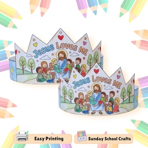 May include: Two paper crowns featuring a colored illustration of a figure with long hair sitting on a bench surrounded by children. The text "Jesus Loves Me" is printed in blue and brown. The crowns are decorated with small red hearts and stars.