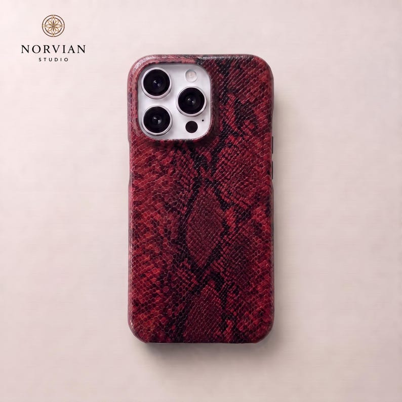 Red snake print iPhone case with bold embossed texture and slim protective fit