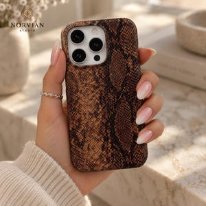 Embossed python pattern phone case with hard shell structure and everyday protection