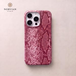 Pink python iPhone case with stylish snake pattern and protective hard shell body
