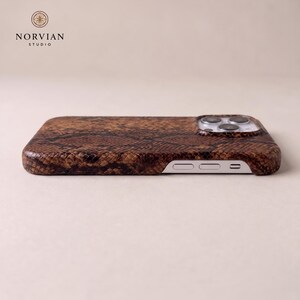 Textured snake pattern iPhone case with durable shell build and precision cutout design
