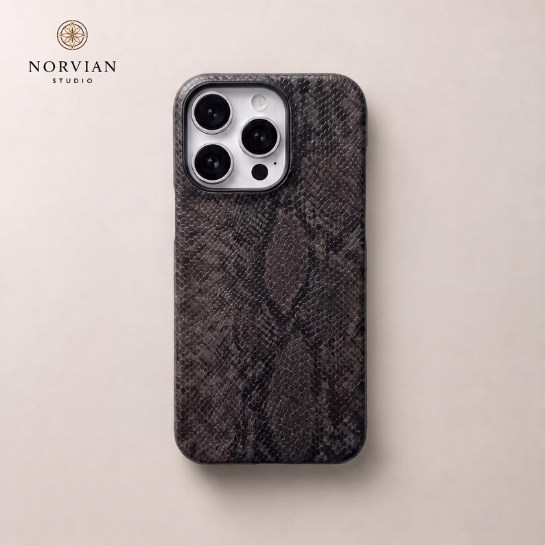 Dark gray snake print iPhone case with embossed texture and precise fit cutouts