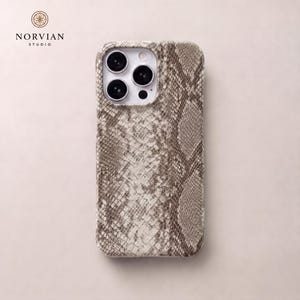 Light beige python pattern case with textured surface and sleek hard shell design