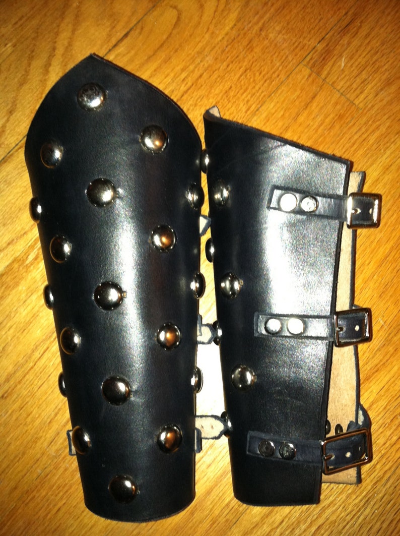 Pair Of Leather Bracers Three Belts Black
