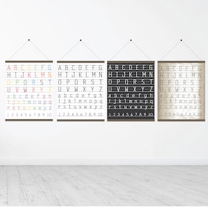 May include: Three alphabet charts with different color schemes. The first chart has a rainbow color scheme, the second chart is black and white, and the third chart is beige and white. Each chart has the alphabet in uppercase and lowercase letters, as well as the numbers 1 through 10.