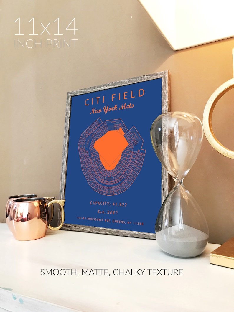 May include: A 11x14 inch print of a blue and orange baseball stadium map with the text "Citi Field, New York Mets, Capacity: 41,922, Est. 2009, 123-01 Roosevelt Ave, Queens, NY 11368". The print has a smooth, matte, chalky texture.