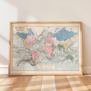 May include: A framed vintage-style world map titled Movements of the Waters, featuring pastel-colored continents and black lines illustrating ocean currents. The map includes a legend and text labels for various currents across the global oceans.