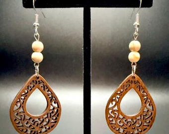Earrings with wooden charms and round beads