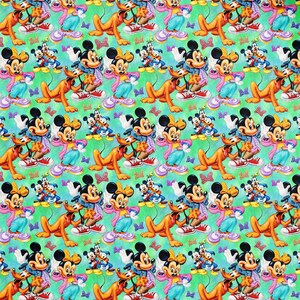 May include: A repeating pattern on a green background featuring cartoon characters Mickey Mouse, Minnie Mouse, and Pluto. The design includes small purple butterflies scattered between the characters, who are wearing colorful clothing and sneakers.