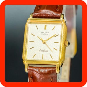 Vintage Mint Seiko Exceline 1221-5670 Gold Tank Shape Women Watch
