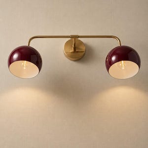 burgundy wall sconce
double wall sconce
brass vanity light
modern wall fixture
dual arm wall light
bathroom wall light
mid century light
burgundy sconce
vanity light brass
minimalist light
wall light fixture
home decor light
luxury wall light
burgundy wall sconce, double wall light, brass wall sconce, vanity wall light, modern wall lamp, bathroom lighting, dome shade light, 2 light sconce, minimal wall light, bedside wall lamp, contemporary light, wall sconce brass, vanity light fixture