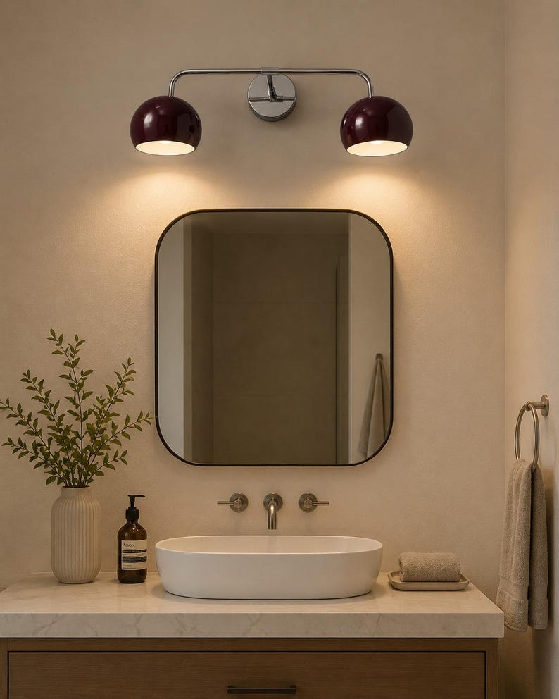burgundy wall sconce
double wall sconce
brass vanity light
modern wall fixture
dual arm wall light
bathroom wall light
mid century light
burgundy sconce
vanity light brass
minimalist light
wall light fixture
home decor light
luxury wall light
burgundy wall sconce, double wall light, brass wall sconce, vanity wall light, modern wall lamp, bathroom lighting, dome shade light, 2 light sconce, minimal wall light, bedside wall lamp, contemporary light, wall sconce brass, vanity light fixture