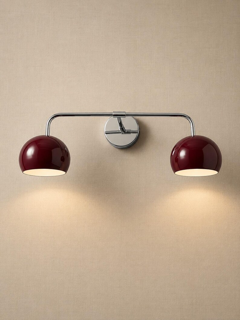 burgundy wall sconce
double wall sconce
brass vanity light
modern wall fixture
dual arm wall light
bathroom wall light
mid century light
burgundy sconce
vanity light brass
minimalist light
wall light fixture
home decor light
luxury wall light
burgundy wall sconce, double wall light, brass wall sconce, vanity wall light, modern wall lamp, bathroom lighting, dome shade light, 2 light sconce, minimal wall light, bedside wall lamp, contemporary light, wall sconce brass, vanity light fixture